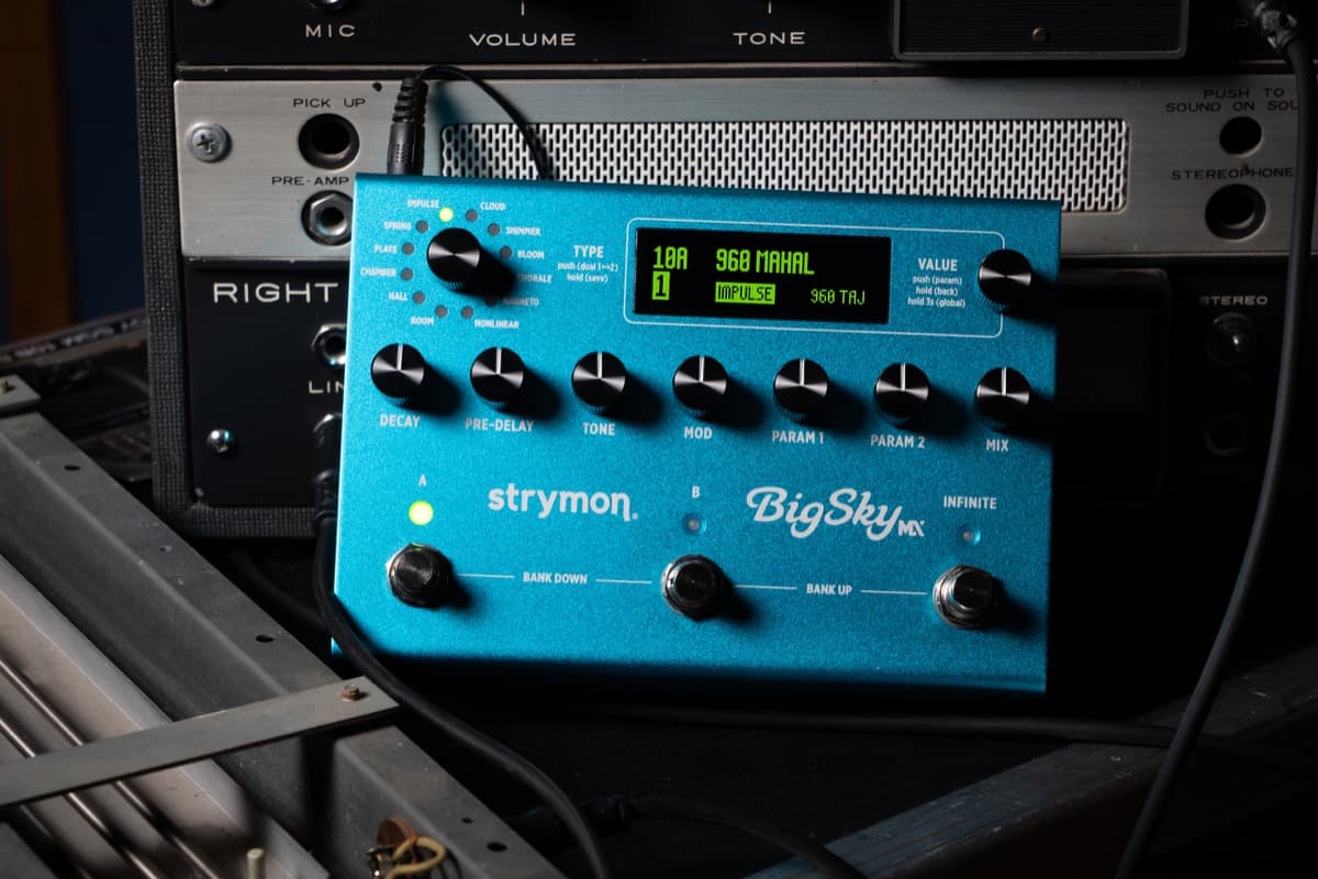 Strymon BigSky MX reverb pedal, beside vintage spring-reverb gear