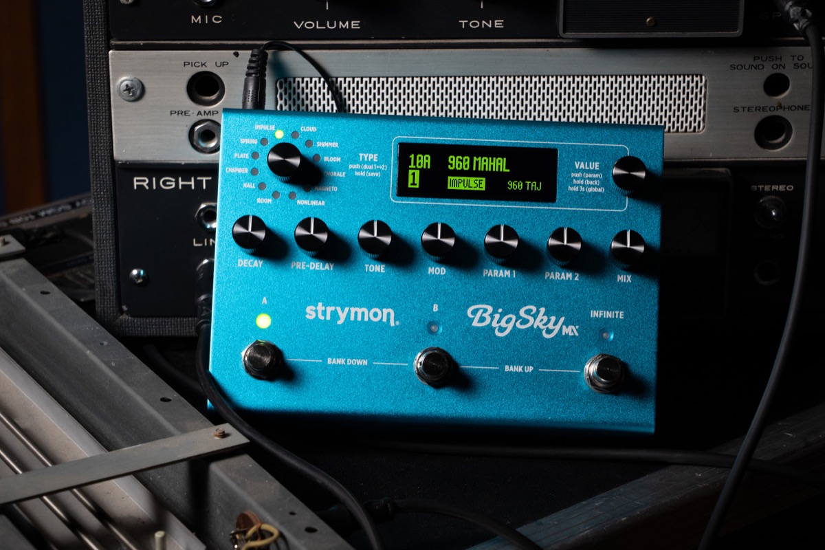 Strymon BigSky MX reverb pedal, beside vintage spring-reverb gear
